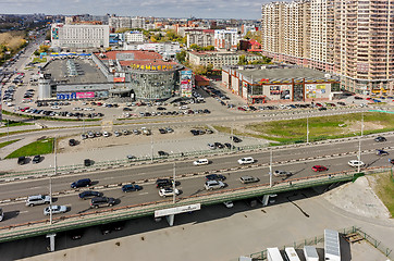 Image showing Shopping centers and bridge over railways. Tyumen