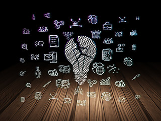 Image showing Business concept: Light Bulb in grunge dark room