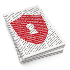 Image showing Security concept: Shield With Keyhole on Newspaper background