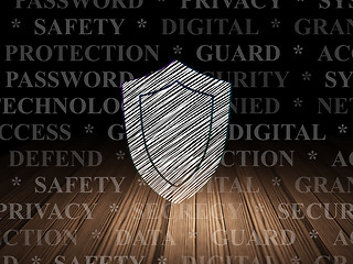 Image showing Privacy concept: Shield in grunge dark room