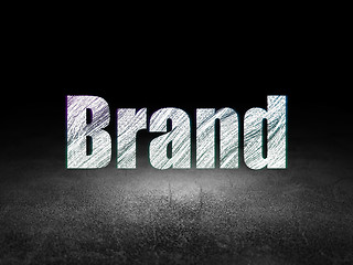 Image showing Advertising concept: Brand in grunge dark room