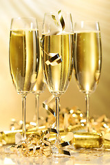 Image showing Glasses of golden champagne