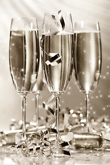 Image showing Glasses of golden champagne