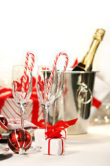 Image showing Champagne with peppermint sticks