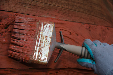 Image showing Painting red wall