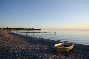 Image showing Boat at a calm bay