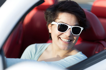 Image showing Woman Driving a Convertible