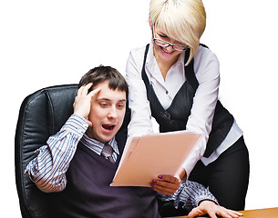 Image showing Businessman and businesswoman reading document