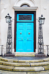 Image showing  blue handle in london antique  brass nail and light