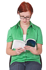 Image showing Redheaded girl reading