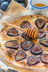Image showing Pizza with ricotta, figs, thyme and honey.