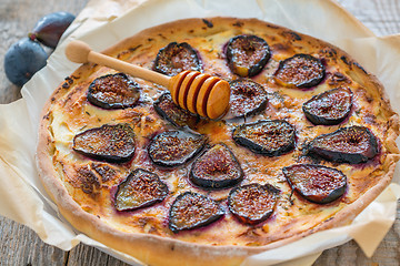 Image showing Pizza with figs, honey and thyme.