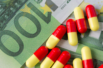 Image showing medical pills or drugs and euro cash money