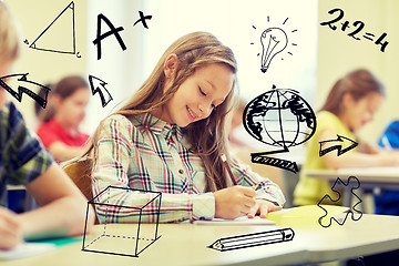 Image showing group of school kids writing test in classroom