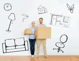 Image showing couple with cardboard boxes moving to new home