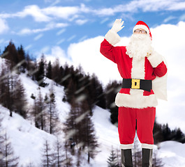 Image showing man in costume of santa claus with bag