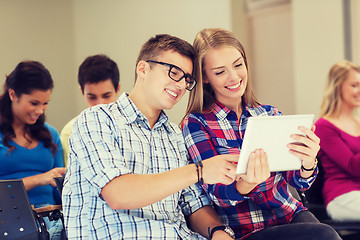 Image showing group of smiling students with tablet pc