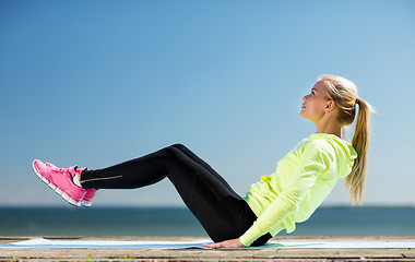 Image showing woman doing sports outdoors