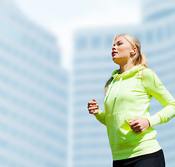 Image showing woman doing running outdoors