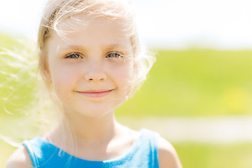 Image showing happy little girl outdoors at summer