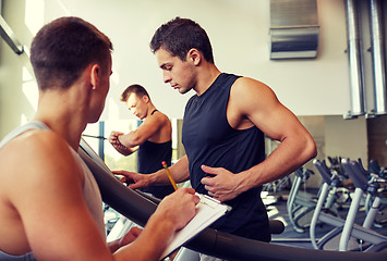 Image showing men exercising on treadmill in gym