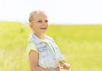 Image showing happy little girl outdoors at summer