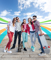 Image showing teenagers with skates outside