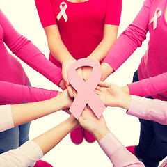 Image showing close up of women with cancer awareness ribbons