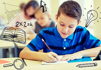 Image showing group of school kids writing test in classroom