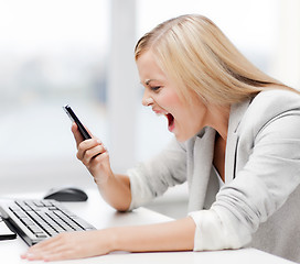 Image showing angry woman with phone