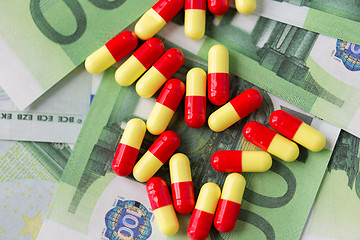 Image showing medical pills or drugs and euro cash money