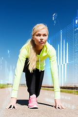 Image showing concentrated woman doing running outdoors