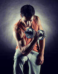 Image showing young man with dumbbell