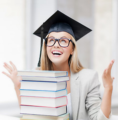 Image showing happy student in graduation cap