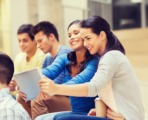 Image showing group of smiling students with tablet pc