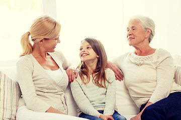 Image showing smiling family at home