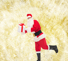 Image showing man in costume of santa claus with gift box