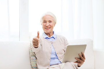 Image showing senior woman with tablet pc showing thumbs up 