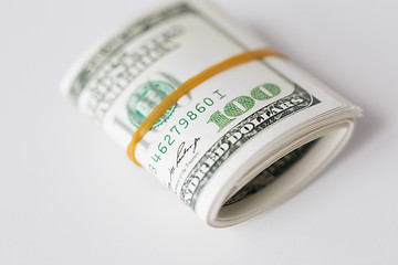 Image showing close up of dollar money packet tied with rubber