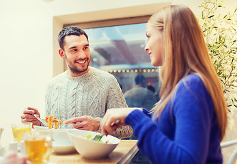 Image showing happy couple meeting and having dinner at cafe