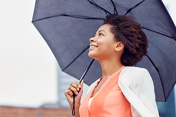 Image showing happy african american businesswoman with umbrella