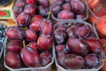 Image showing close up of satsuma plums at street market