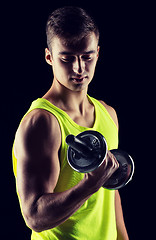 Image showing young man with dumbbell