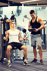 Image showing man exercising on gym machine