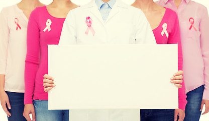 Image showing close up of women with cancer awareness ribbons