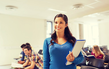 Image showing group of smiling students in lecture hall