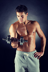 Image showing young man with dumbbell