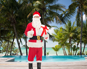 Image showing man in costume of santa claus with gift box