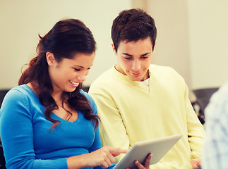 Image showing group of smiling students with tablet pc