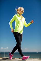 Image showing woman doing sports outdoors